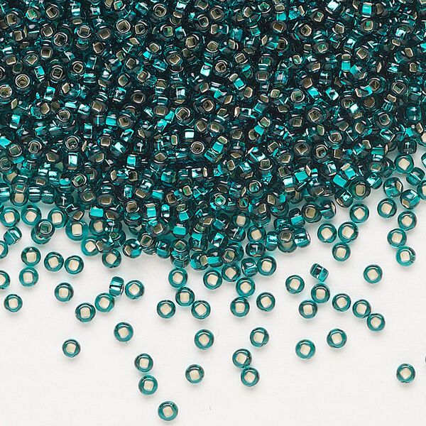 Seed bead, Preciosa Ornela Czech glass, pkg/500g, #11 rocaille, transparent silver-lined teal, (57710). image number 0