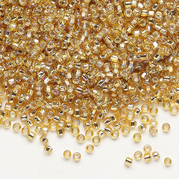 Seed bead, Dyna-Mites™, glass, pkg/40g, #11 round, translucent silver-lined rainbow gold, (62R:SR 11/0 SR). image number 0