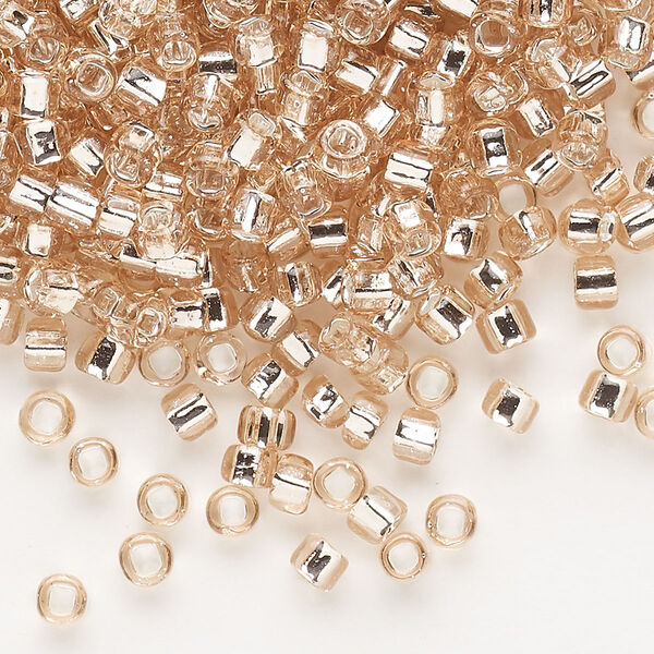 Seed bead, Dyna-Mites™, glass, silver-lined translucent light pink, #6 round with square hole. Sold per 40-gram pkg. image number 0