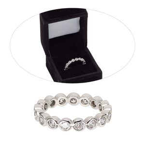 Ring, cubic zirconia and rhodium-finished brass, clear, 4mm wide eternity band, size 8. Sold individually.
