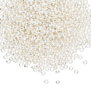 Crimp, silver-finished brass, 1.9x1.6mm round, 1.25mm inside diameter. Sold per pkg of 1,000.