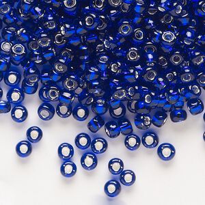 Seed bead, Dyna-Mites™, glass, transparent silver-lined cobalt, #6 round. Sold per 40-gram pkg.