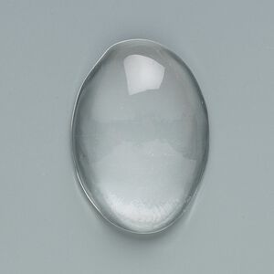 Cabochon, glass, clear, 30x22mm non-calibrated oval. Sold per pkg of 6.