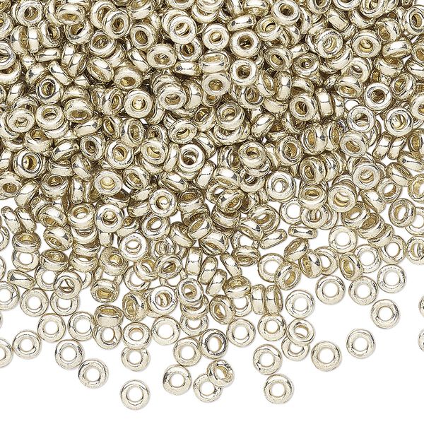 Seed bead, Miyuki, glass, pkg/10g, 3x1.3mm spacer rondelle, opaque brass-plated, (SPR3-4201). image number 0