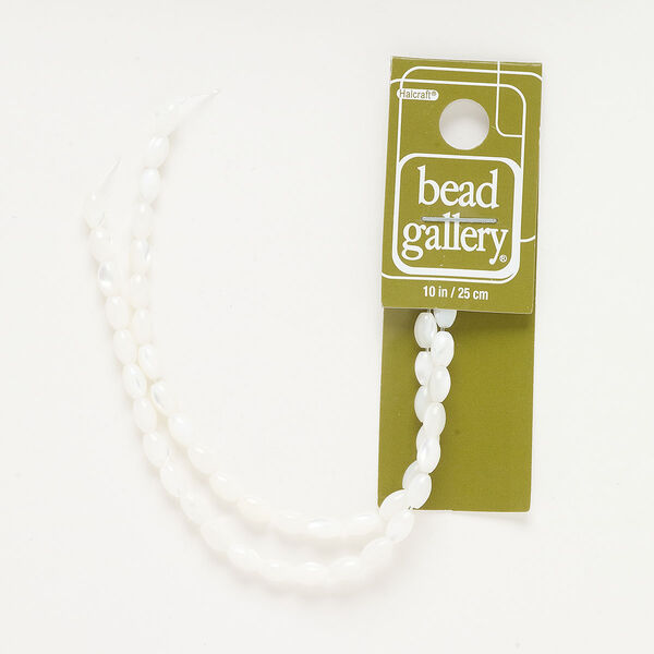 Bead, mother-of-pearl shell (bleached), white, 6x4mm oval, Mohs hardness 3-1/2. Sold per 10-inch strand, approximately 45 beads. image number 0