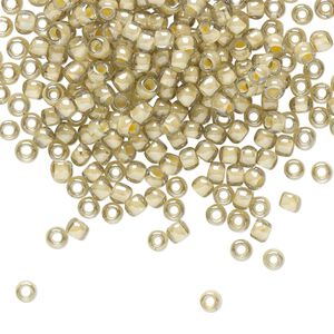 Seed bead, TOHO BEADS®, glass, pkg/7.5g, #8 round, opaque orange crème-lined black diamond (TR-08-369).