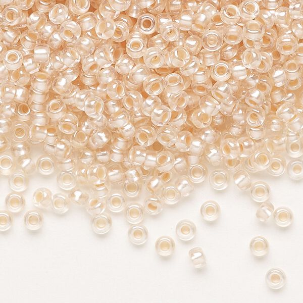 Seed bead, Preciosa Ornela, glass, translucent salmon pearl-lined crystal clear, #8 rocaille. Sold per 50-gram pkg. image number 0