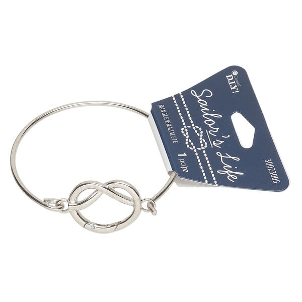 Bracelet, bangle 1pkg1, silver-finished brass and steel, 7 inches with 22.5mm hinged clasp knot. image number 0