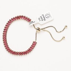 Bracelet, adjustable, brass / glass / silicone, pkg/1, 6 to 10 inches, gold plate and ruby.