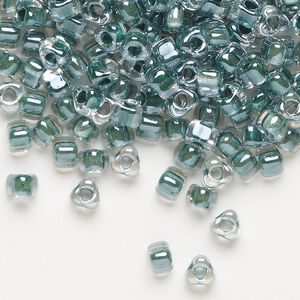 Seed bead, Miyuki, glass, transparent clear color-lined teal, (TR1117), #5 triangle. Sold per 250-gram pkg.