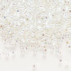 Seed bead, Delica®, glass, pkg/7.5g, #10 round, translucent rainbow crystal clear (DBM-0051).
