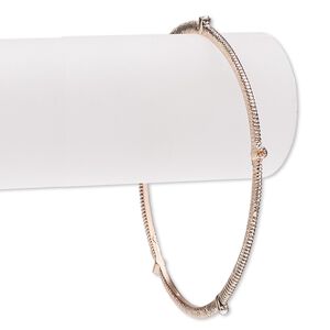 Bracelet, bangle, glass rhinestone and copper-finished brass, clear, 3mm wide with corrugated design, 7-1/2 inches. Sold individually.