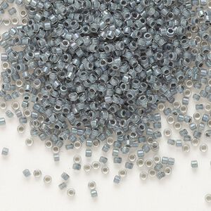 Seed bead, Delica®, glass, pkg/50g, #11 round, translucent grey-lined luster crystal clear (DB-0081).