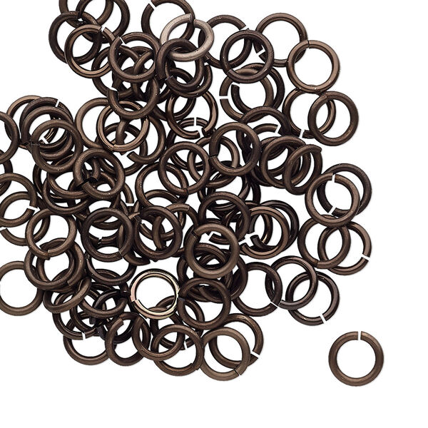 Jump ring, anodized tempered aluminum, brown, 6mm round, 4.2mm inside diameter, 18 gauge. Sold per pkg of 100. image number 0