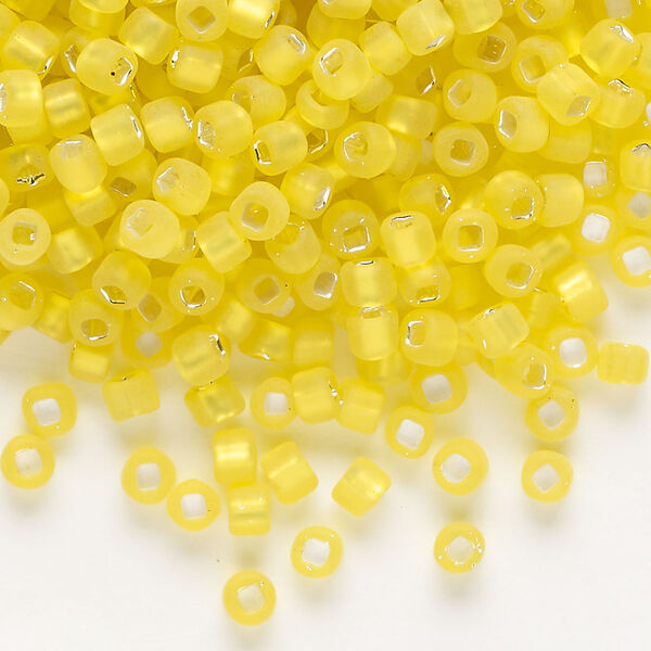 Seed bead, Dyna-Mites™, glass, silver-lined translucent matte yellow, #6 round with square hole. Sold per 40-gram pkg. image number 0
