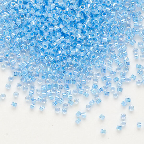 Seed bead, Delica®, glass, pkg/50g, #11 round, translucent light blue-lined rainbow crystal clear (DB-0076). image number 0