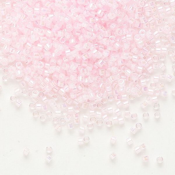 Seed bead, Delica®, glass, pkg/7.5g, #11 round, translucent pink-lined rainbow crystal clear (DB-0055). image number 0