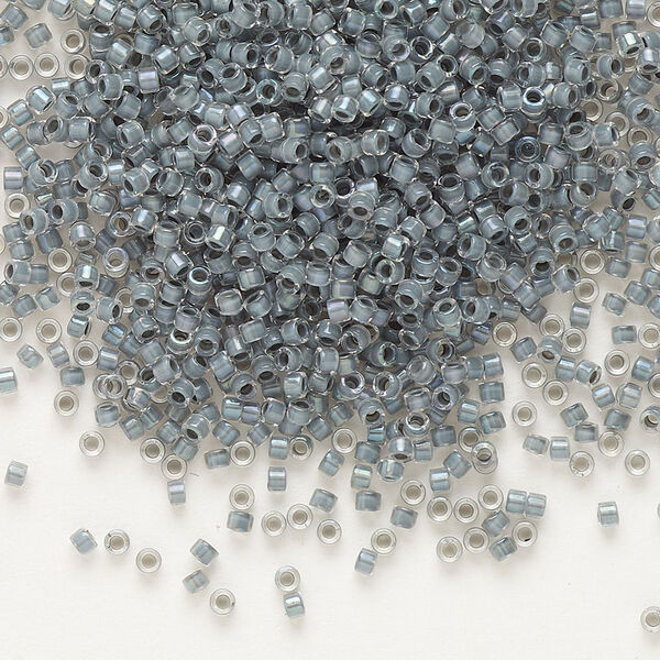Seed bead, Delica®, glass, pkg/7.5g, #11 round, translucent grey-lined luster crystal clear (DB-0081). image number 0