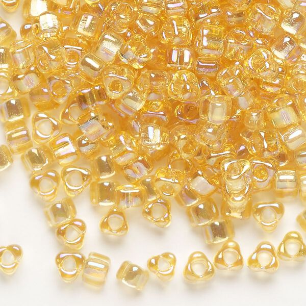 Seed bead, Miyuki, glass, transparent iris amber yellow, (TR1152), #5 triangle. Sold per 25-gram pkg. image number 0