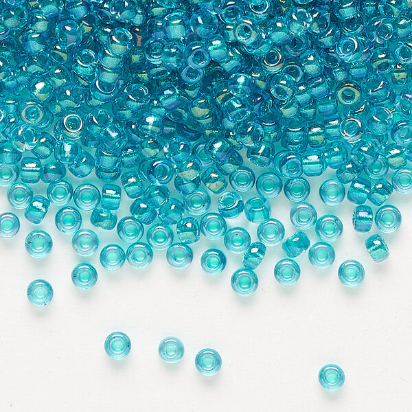 Seed bead, Miyuki, glass, pkg/250g, #8 rocaille, translucent teal-lined luster crystal clear (RR-3742). image number 0