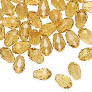 Bead Celestial Crystal® 1pkg60, 8x6mm teardrop / 66 facets, transparent gold