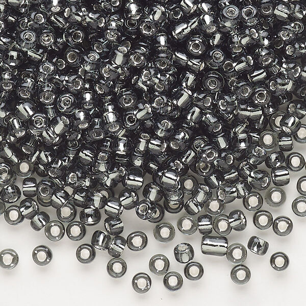 Seed bead, Dyna-Mites™, glass, silver-lined translucent gunmetal, #8 round. Sold per 1/2 kilogram pkg. image number 0