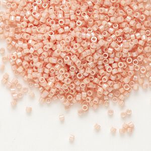 Seed bead, Delica®, glass, pkg/7.5g, #11 round, opaque rainbow gold luster salmon (DB-0207).