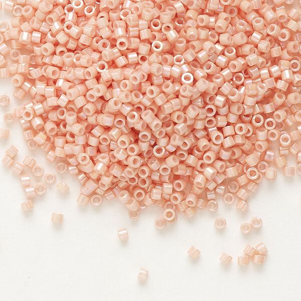 Seed bead, Delica®, glass, pkg/7.5g, #11 round, opaque rainbow gold luster salmon (DB-0207). image number 0
