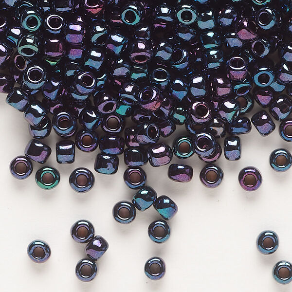 Seed bead, Dyna-Mites™, glass, opaque iris blue, #6 round. Sold per 40-gram pkg. image number 0