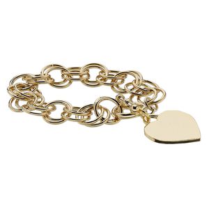 Bracelet, gold-plated steel and brass, 14mm wide with 27mm flat heart, 6 inches with toggle clasp. Sold individually.