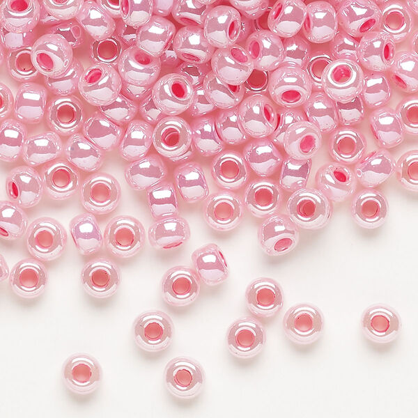 Seed bead, Miyuki, glass, pkg/25g, #6 rocaille, opaque carnation pink luster alabaster (RR-535). image number 0