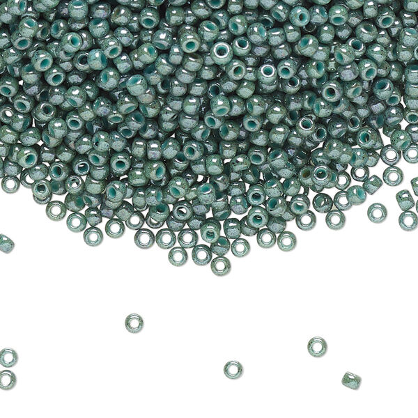 Seed bead, TOHO BEADS®, glass, pkg/250g, #11 round, opaque marbled turquoise blue (TR-11-1207). image number 0