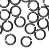 Jump ring, anodized aluminum, black, 10mm round, 6.8mm inside diameter, 14 gauge. Sold per pkg of 100. image number 0