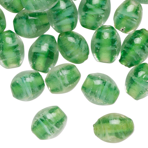 Bead, glass, translucent green, 10x8mm-11x9mm oval. Sold per 2-ounce pkg, approximately 55 beads. image number 0