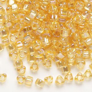 Seed bead, Miyuki, glass, transparent iris amber yellow, (TR1152), #5 triangle. Sold per 250-gram pkg.