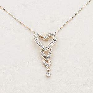 Necklace, Czech glass rhinestone / gold-finished steel / brass / "pewter" (zinc-based alloy), clear, 38x20mm triple heart, 17 inches with 2-inch extender chain and lobster claw clasp. Sold individually.