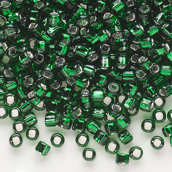 Seed bead, Dyna-Mites™, glass, silver-lined translucent emerald green, #6 round with square hole. Sold per 1/2 kilogram pkg. image number 0