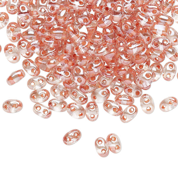 Seed bead, Preciosa Twin™ Czech glass, pkg/250g, 5x2.5mm oval, transparent peach terra color-lined clear, (38689). image number 0