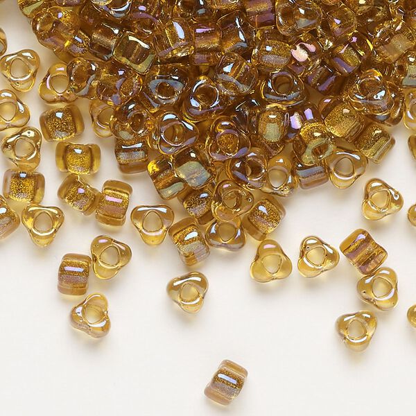 Seed bead, Miyuki, glass, transparent yellow color-lined gold, (TR1126), #5 triangle. Sold per 250-gram pkg. image number 0