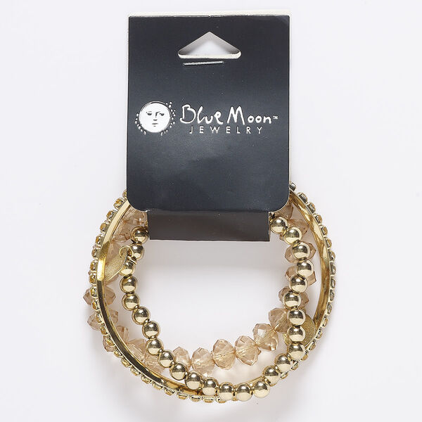 Bracelet mix, bangle and stretch, acrylic and gold-finished steel, topaz, (2) 6mm wide and (1) 10mm wide with stardust, 8-1/2 inches and adjustable from 6-1/2 to 7-1/2 inches. Sold per pkg of 3. image number 0