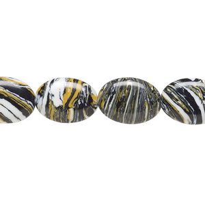 Bead, resin, black / white / dark yellow, 14x10mm flat oval. Sold per 15" to 16" strand.
