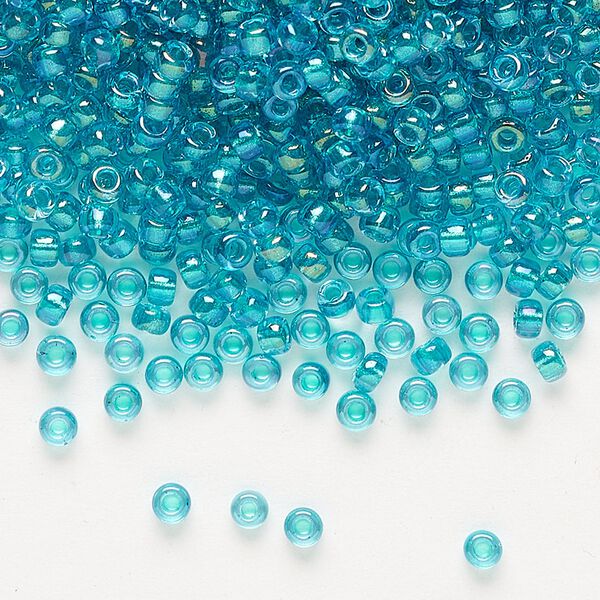 Seed bead, Miyuki, glass, pkg/50g, #8 rocaille, translucent teal-lined luster crystal clear (RR-3742). image number 0