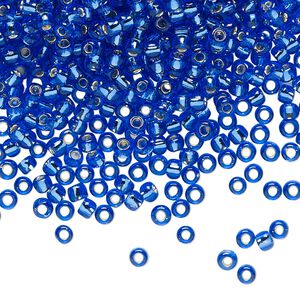 Seed bead, TOHO BEADS®, glass, pkg/50g, #8 round, transparent silver-lined sapphire (TR-08-35).