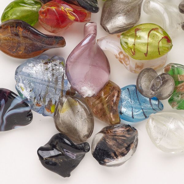 Bead mix, lampworked glass, opaque and translucent multicolored with silver-colored foil and copper-colored glitter, 16x12mm-32x24mm twisted oval. Sold per 4-ounce pkg, approximately 40 beads. image number 0