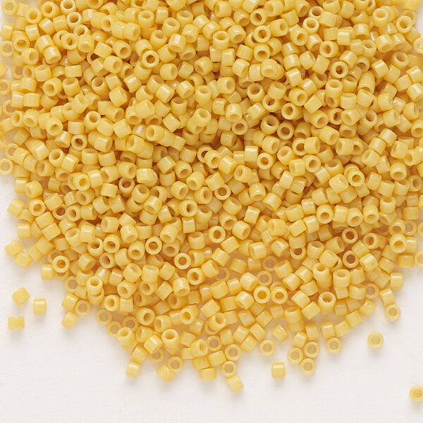 Seed bead, Delica®, glass, pkg/50g, #11 round, Duracoat® opaque outside dyed light yellow (DB-2102). image number 0