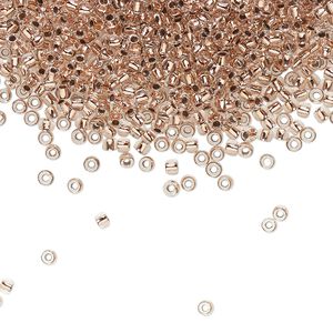 Seed bead, TOHO BEADS®, glass, pkg/50g, #11 round, transparent copper-lined crystal clear (TR-11-740).