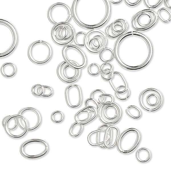 Jump ring mix, sterling silver, 3-10mm round with 1.4-7.6mm inside diameter and 4x3mm-7x5mm oval with 2.5x1.5mm-5x3.3mm inside diameter, 20-26 gauge. Sold per 5-gram pkg, approximately 75-85 jump rings. image number 0