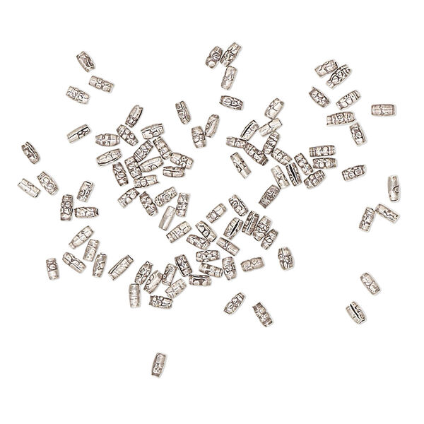 Bead, antiqued fine silver, 2x1mm textured oval. Sold per 1-gram pkg, approximately 95 beads. image number 0
