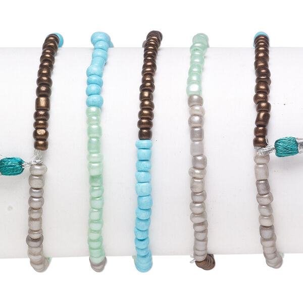 Bracelet mix, stretch, glass, dark brown / turquoise blue / multicolored, #6 round with 45mm tassel, 7-1/2 inches. Sold per pkg of 5. image number 0