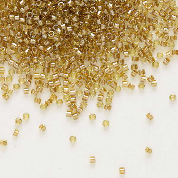 Seed bead, Delica®, glass, pkg/250g, #11 round, translucent honey beige-lined luster chartreuse (DB-0909). image number 0